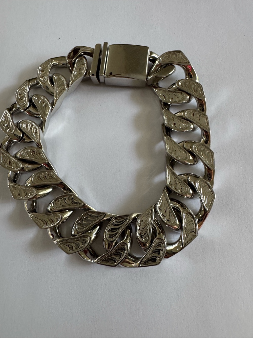 9.5” Montana Silversmiths Polished Silver Engraved Cuban Link Bracelet